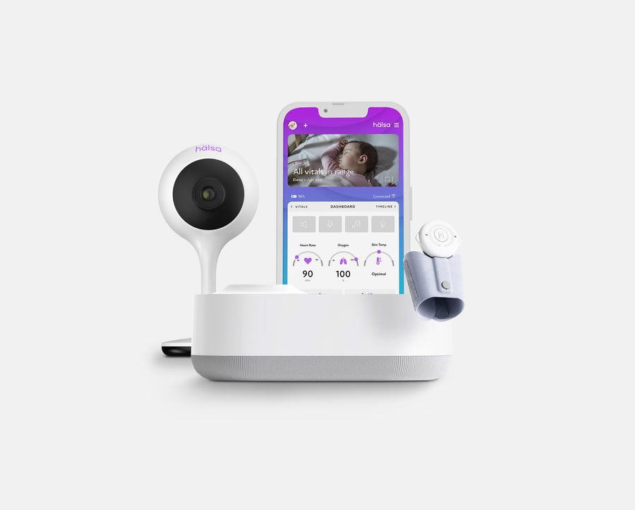 Hälsa Baby all-in-one wellness monitor featuring a baby cam and baby oxygen monitor, with a connected mobile app displaying vital signs like oxygen levels, heart rate, skin temp and sleep data.