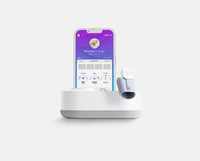 Hälsa Baby wellness monitor showcasing baby temperature monitor features, with a smart app interface displaying vital stats like heart rate, oxygen levels, and skin temperature.