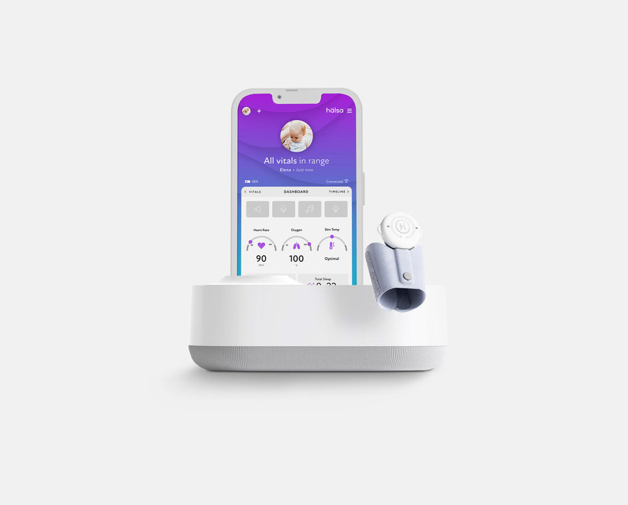 Hälsa Baby wellness monitor showcasing baby temperature monitor features, with a smart app interface displaying vital stats like heart rate, oxygen levels, and skin temperature.